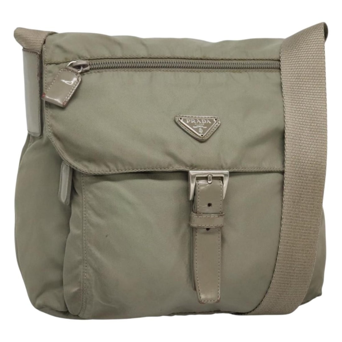 PRADA Green Silver Nylon Shoulder Bag Auth Italy 121113: PRADA Green Silver Nylon Shoulder Bag Auth Italy 121113 This authentic PRADA shoulder bag showcases a stylish design crafted from durable nylon in a striking green and silver color combination. Perfec