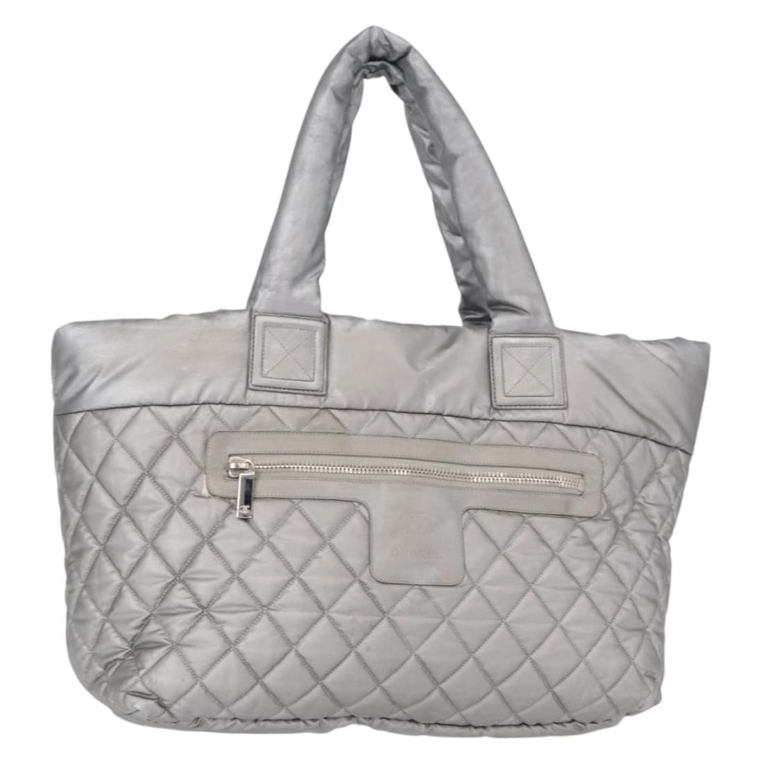 CHANEL Cococoon Gray Silver Nylon Tote Bag Auth BS31124: CHANEL Cococoon Gray Silver Nylon Tote Bag Auth BS31124 This CHANEL Cococoon Tote Bag features a stylish gray and silver nylon exterior, perfect for everyday use. With a height of approximately 9.8 in