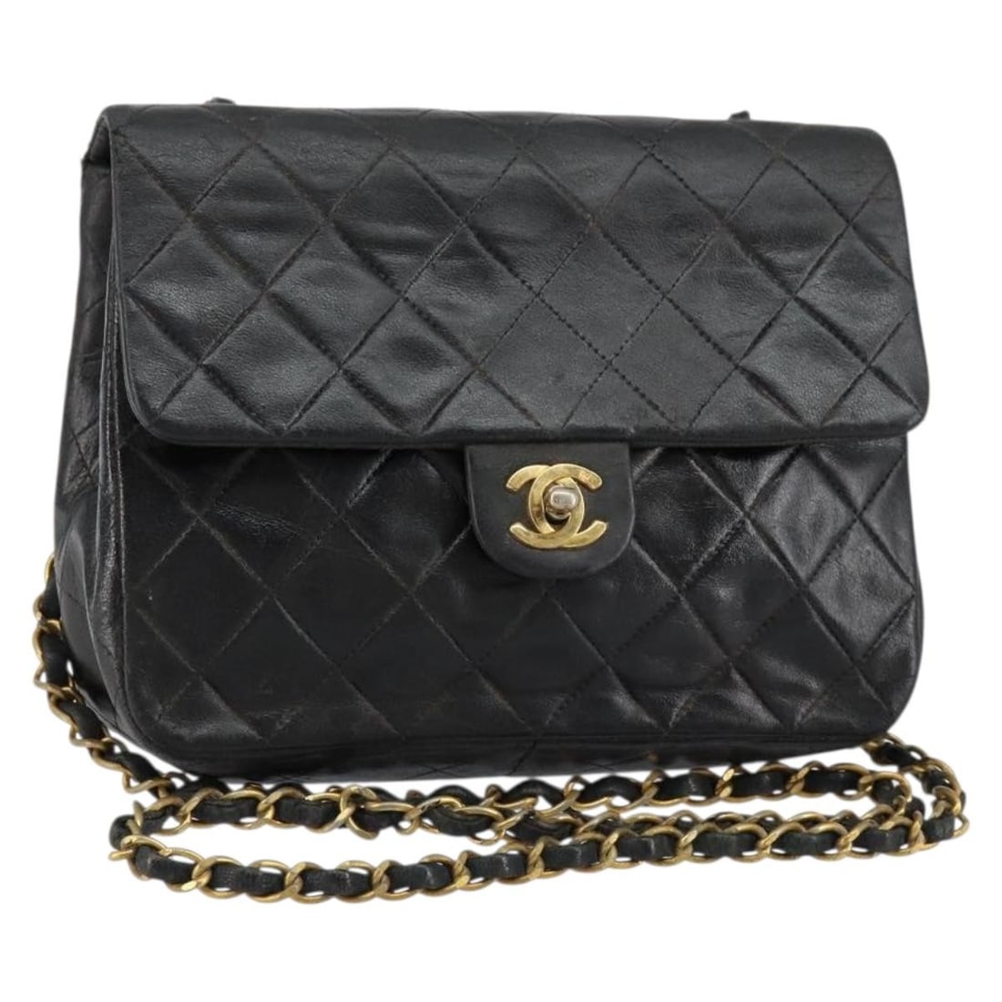 Chanel Mini Matelasse Black Leather Chain Shoulder Bag Gold CC Hardware: Chanel Mini Matelasse Black Leather Chain Shoulder Bag Gold CC Hardware This CHANEL Mini Matelasse chain shoulder bag features black leather with gold accents and the signature CC logo. The bag is des