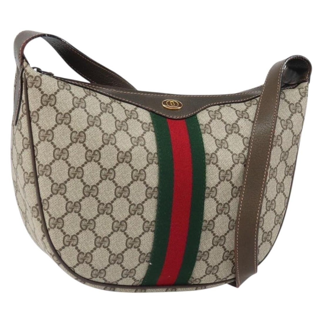 Beige PVC GG Supreme Web Sherry Line Shoulder Bag by Gucci 010 378: Beige PVC GG Supreme Web Sherry Line Shoulder Bag by Gucci 010 378 This GUCCI GG Supreme Web Sherry Line shoulder bag features a beige and gold design crafted from PVC leather and GG canvas. The bag o