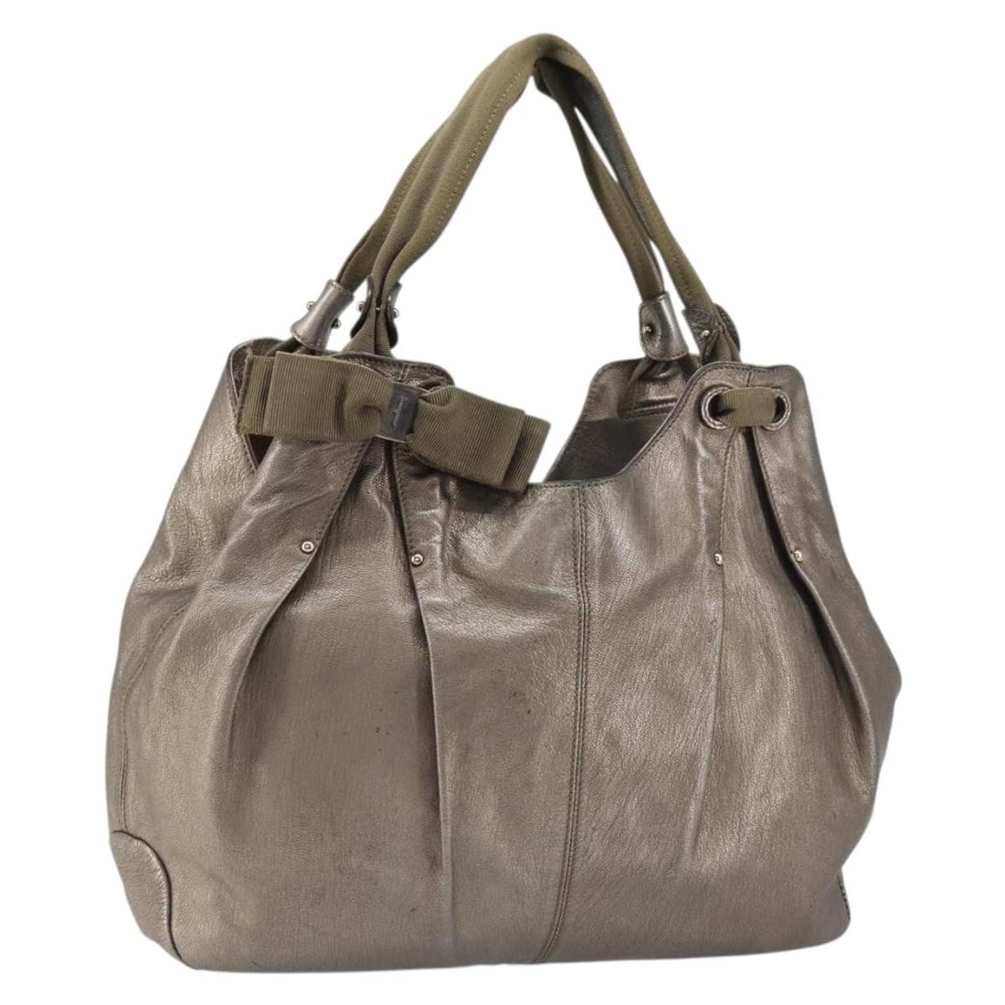 Gold Tone Leather Vala Handbag by Salvatore Ferragamo Italy: Gold Tone Leather Vala Handbag by Salvatore Ferragamo Italy This Salvatore Ferragamo Vala handbag is crafted from gold tone leather and features dual top handles. The bag is made in Italy and showcase