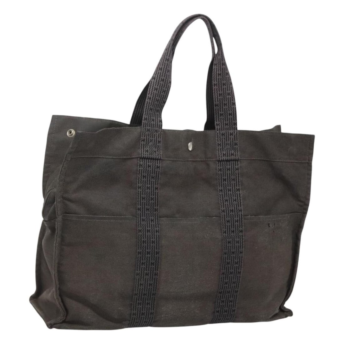 HERMES Her Line MM Hand Bag Gray Canvas Made in France: HERMES Her Line MM Hand Bag Gray Canvas Made in France This HERMES Her Line MM Hand Bag is an elegant accessory crafted from high-quality gray canvas. With dimensions of approximately 17.3 inches in l