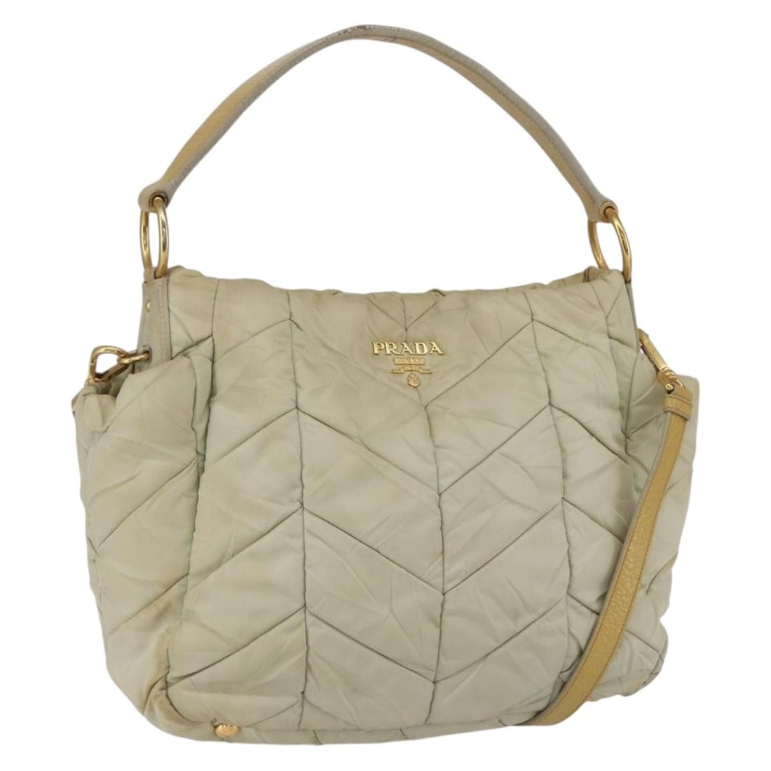 PRADA Nylon Hand Bag 2way Beige Gold Made in Italy: PRADA Nylon Hand Bag 2way Beige Gold Made in Italy This exquisite PRADA Hand Bag is crafted from durable nylon in a sophisticated beige and gold color scheme. Made in Italy, it features a versatile 2-