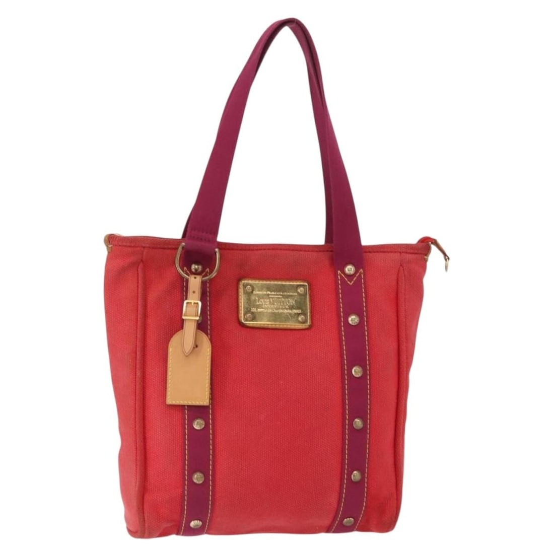 LOUIS VUITTON Antigua Cabas MM Red Canvas Tote Bag M40034: LOUIS VUITTON Antigua Cabas MM Red Canvas Tote Bag M40034 This authentic LOUIS VUITTON Antigua Cabas MM Tote Bag is a stylish accessory that combines functionality with luxury. Crafted in France, it f