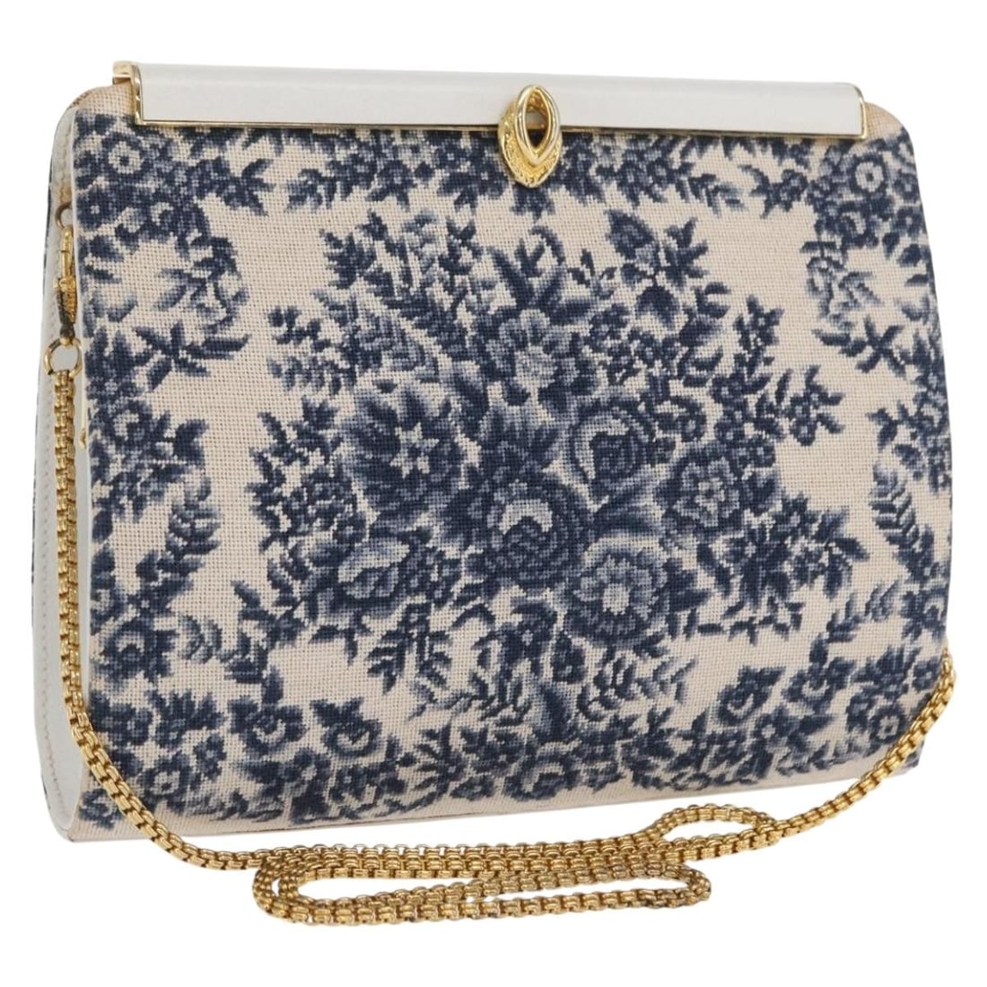 Navy and Gold Canvas BALLY Chain Shoulder Bag Made in Italy: Navy and Gold Canvas BALLY Chain Shoulder Bag Made in Italy This BALLY shoulder bag features a navy and gold canvas exterior, complemented by a chain shoulder strap. Made in Italy, the bag is designed