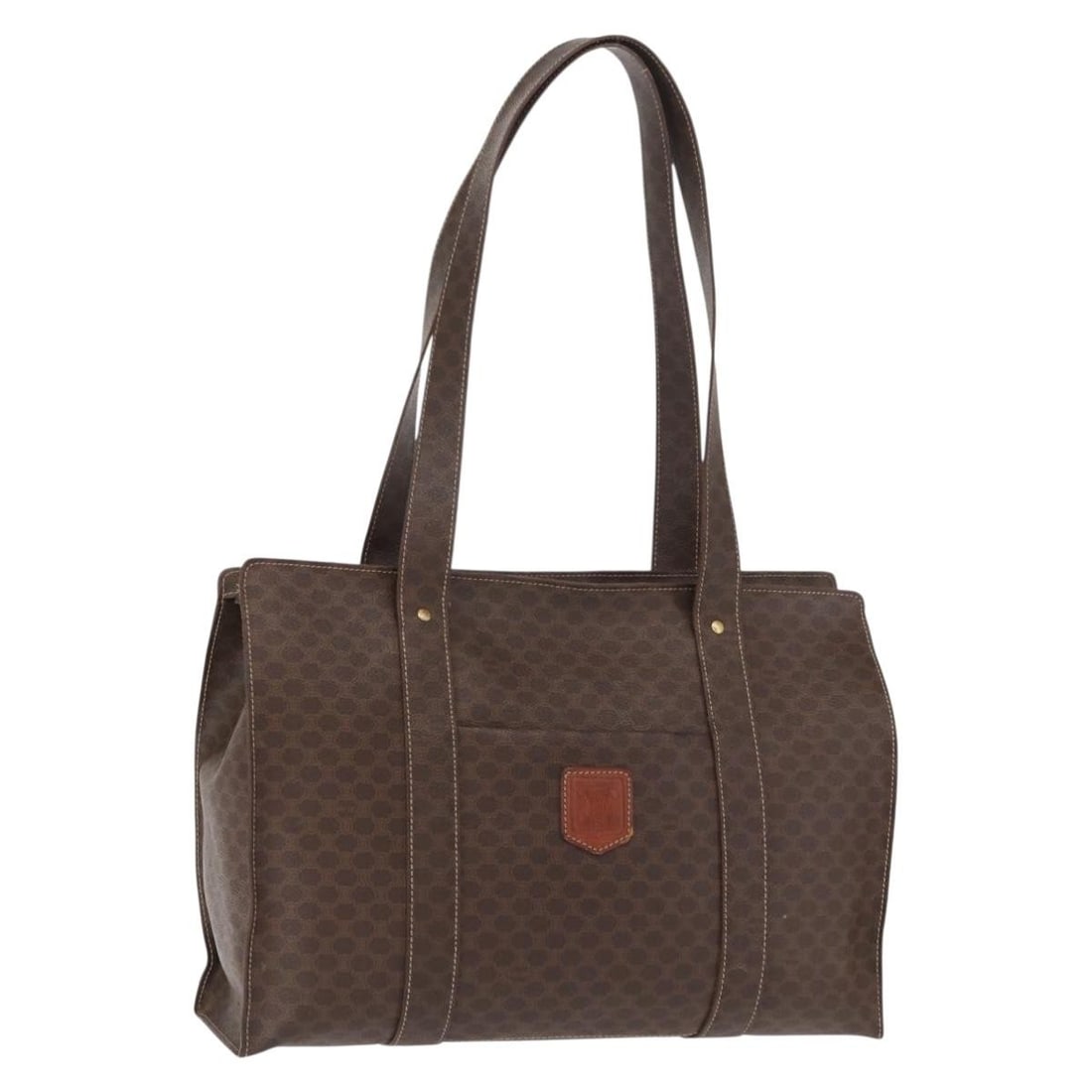 Celine Macadam Brown PVC Canvas Leather Tote Bag Gold Accents: Celine Macadam Brown PVC Canvas Leather Tote Bag Gold Accents This CELINE Macadam tote bag features a brown and gold color scheme crafted from PVC leather and Macadam canvas. The bag is designed with