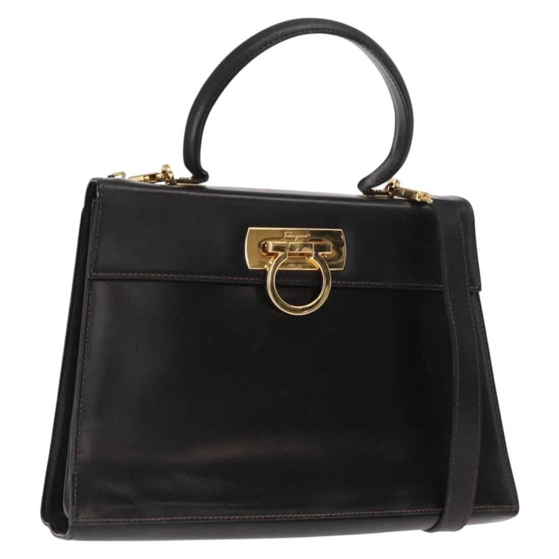 Black Leather Gancini Shoulder and Top Handle Bag by Salvatore Ferragamo: Black Leather Gancini Shoulder and Top Handle Bag by Salvatore Ferragamo This Salvatore Ferragamo Gancini hand bag features a classic black leather exterior with gold-tone accents. Designed for versat