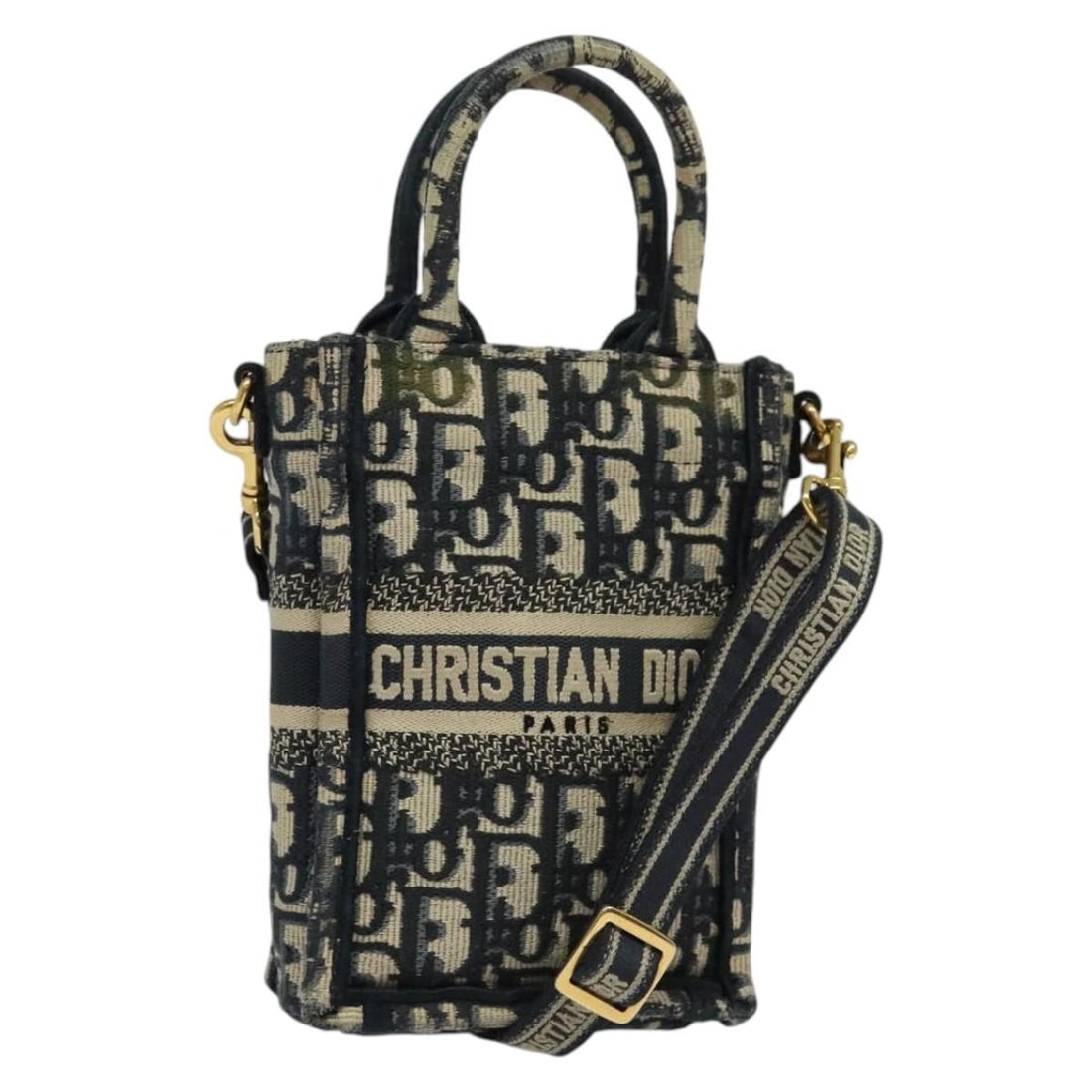 Christian Dior Trotter Canvas Mini Hand Bag Navy Gold Auth 137179: Christian Dior Trotter Canvas Mini Hand Bag Navy Gold Auth 137179 Discover the elegance of the Christian Dior Trotter Canvas Book Tote Mini Hand Bag. Crafted in Italy, this stylish handbag features a