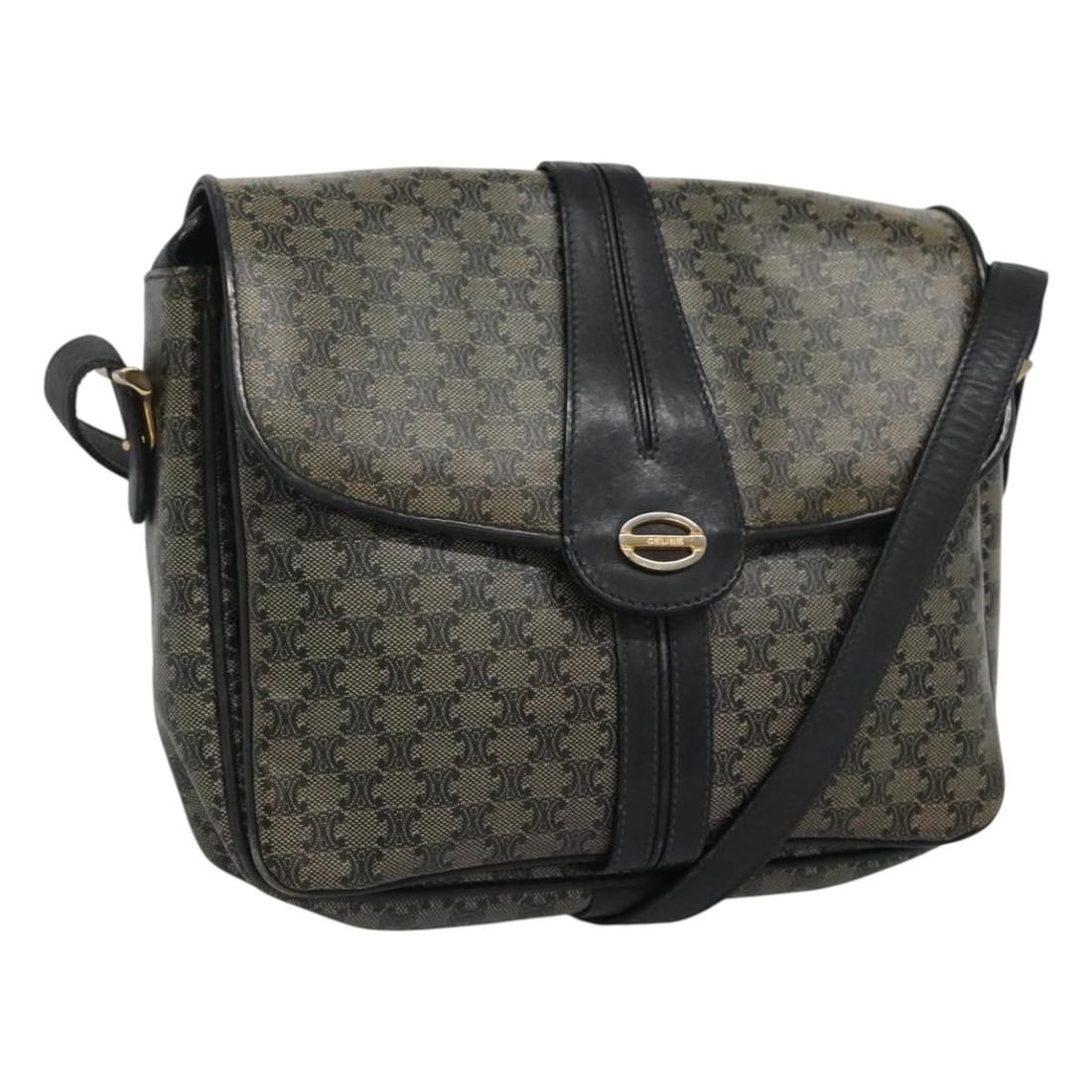 CELINE Navy Macadam Canvas Shoulder Bag Made in Italy: CELINE Navy Macadam Canvas Shoulder Bag Made in Italy The CELINE Macadam Canvas Shoulder Bag in Navy is a stylish and functional accessory crafted from durable Macadam canvas. This shoulder bag combin