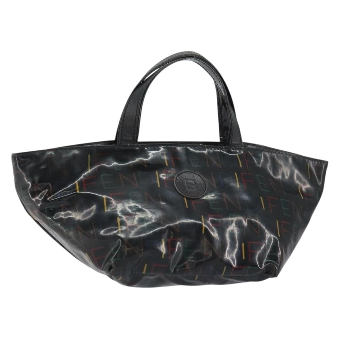 Black Enamel Fendi Handbag with Top Handle Made in Italy: Black Enamel Fendi Handbag with Top Handle Made in Italy This FENDI handbag is crafted from black enamel and made in Italy. It features a compact silhouette with a top handle and shows signs of heavy