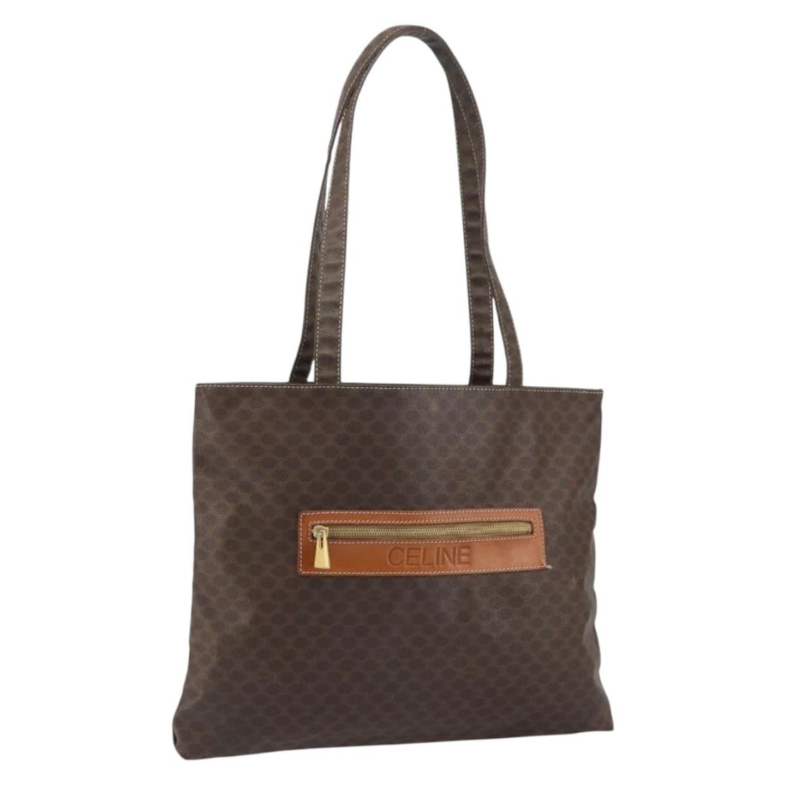 CELINE Brown Gold Macadam Canvas Tote Bag PVC Leather Italy: CELINE Brown Gold Macadam Canvas Tote Bag PVC Leather Italy This CELINE Macadam Canvas Tote Bag is a stylish accessory crafted in Italy, featuring a combination of PVC leather and Macadam canvas in a