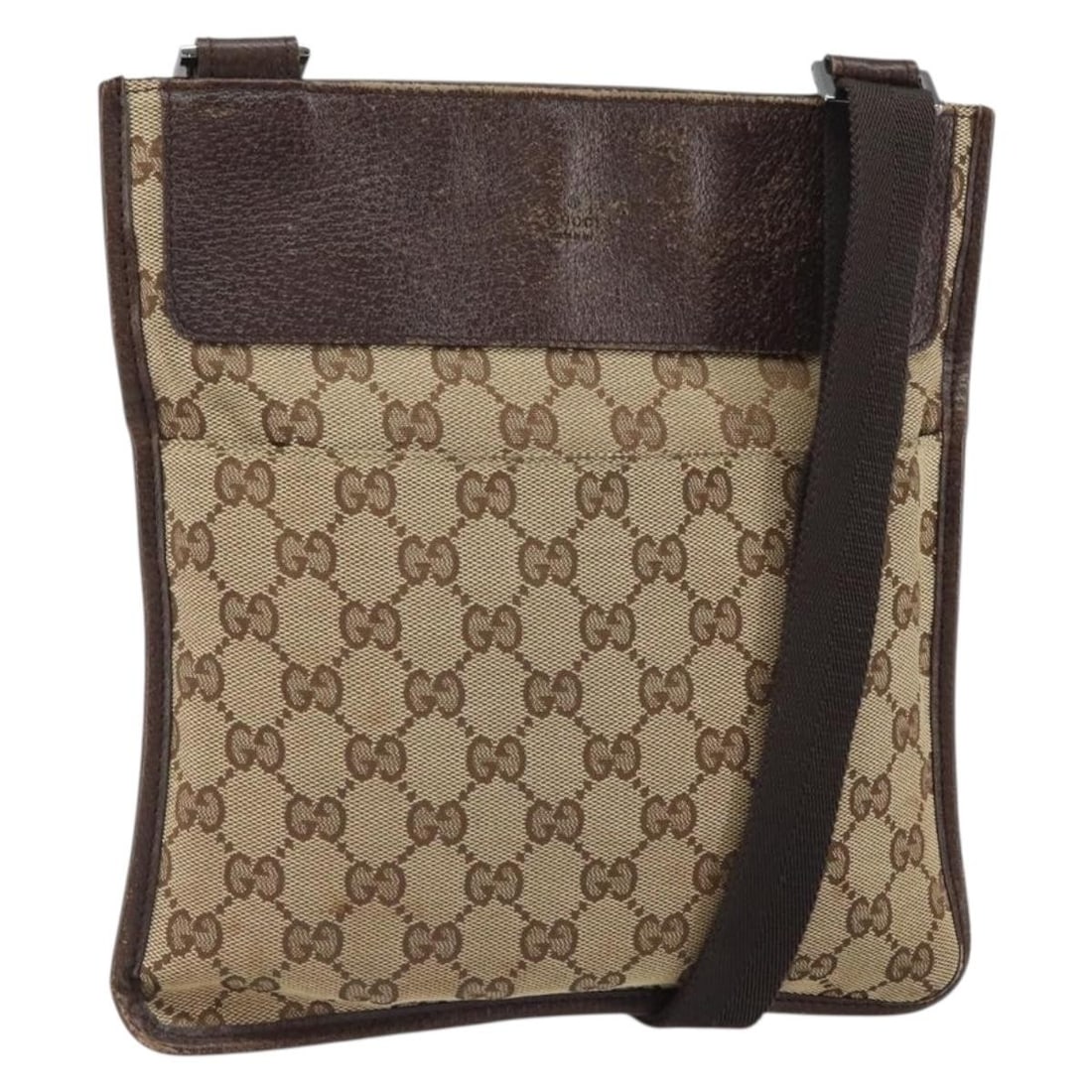 Beige Silver GG Canvas Shoulder Bag by Gucci Model 27639: Beige Silver GG Canvas Shoulder Bag by Gucci Model 27639 This is a GUCCI GG Canvas shoulder bag in beige and silver. Crafted in Italy, the bag features the iconic GG canvas exterior and a versatile ad