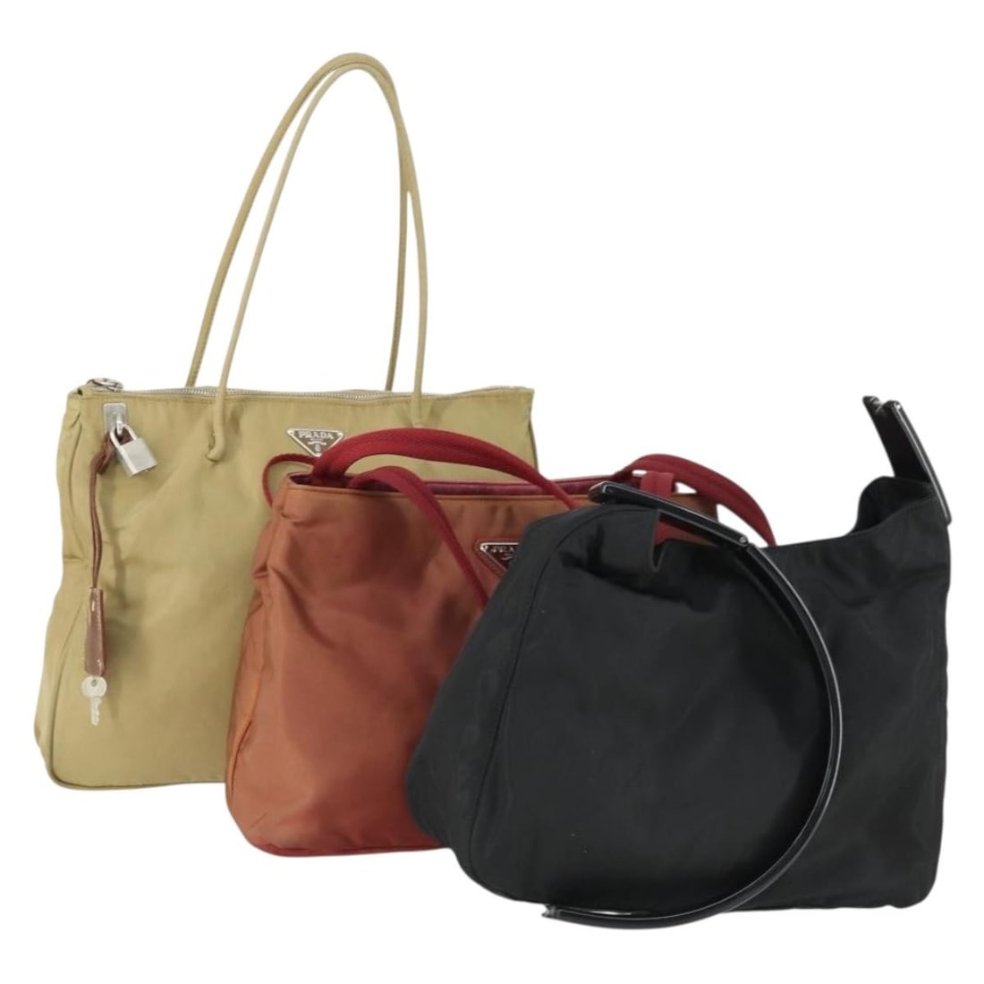 Three Piece PRADA Nylon Tote Bag Set Black Red Beige With Accessories: Three Piece PRADA Nylon Tote Bag Set Black Red Beige With Accessories This is a PRADA three-piece tote bag set crafted from nylon in black, red, and beige. Made in Italy, each bag features a tote styl