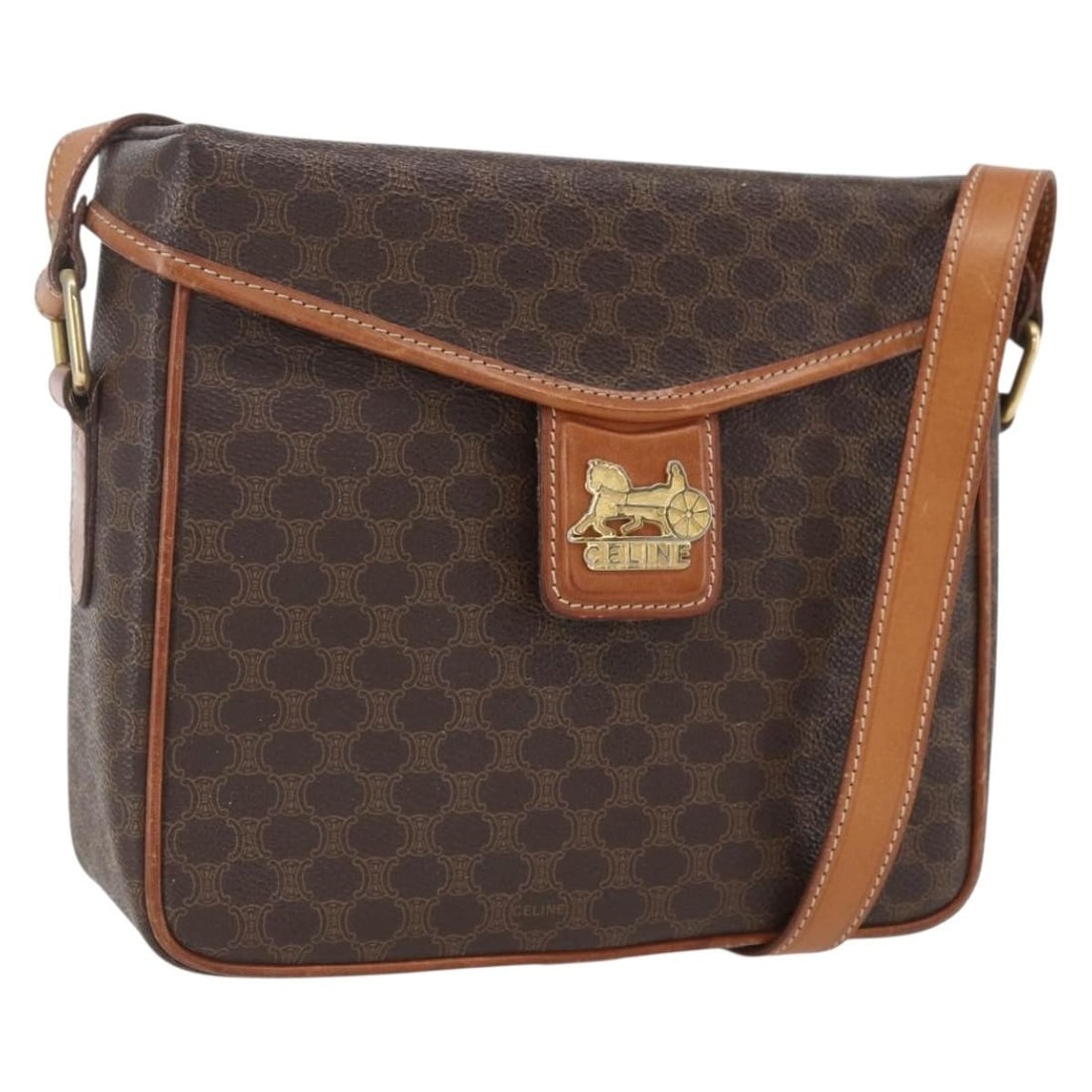 Celine Macadam Brown PVC and Leather Shoulder Bag Gold Accents Italy: Celine Macadam Brown PVC and Leather Shoulder Bag Gold Accents Italy This CELINE Macadam shoulder bag features a brown and gold PVC leather exterior with Macadam canvas detailing. Designed with an adj