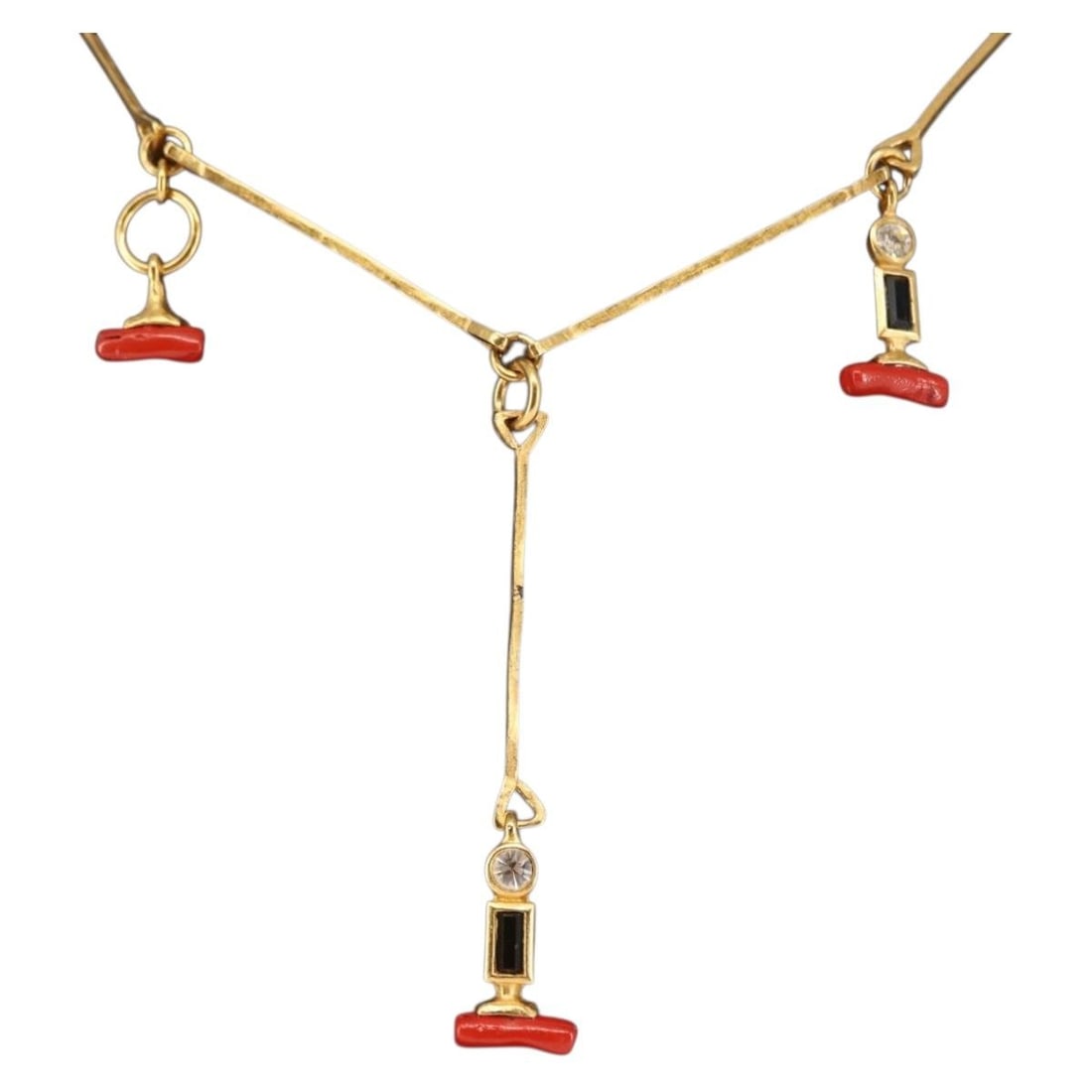 BALENCIAGA Gold Metal Necklace Made in France: BALENCIAGA Gold Metal Necklace Made in France This Balenciaga necklace showcases a modern design crafted from durable metal with an elegant gold finish. Produced in France, this statement piece featur