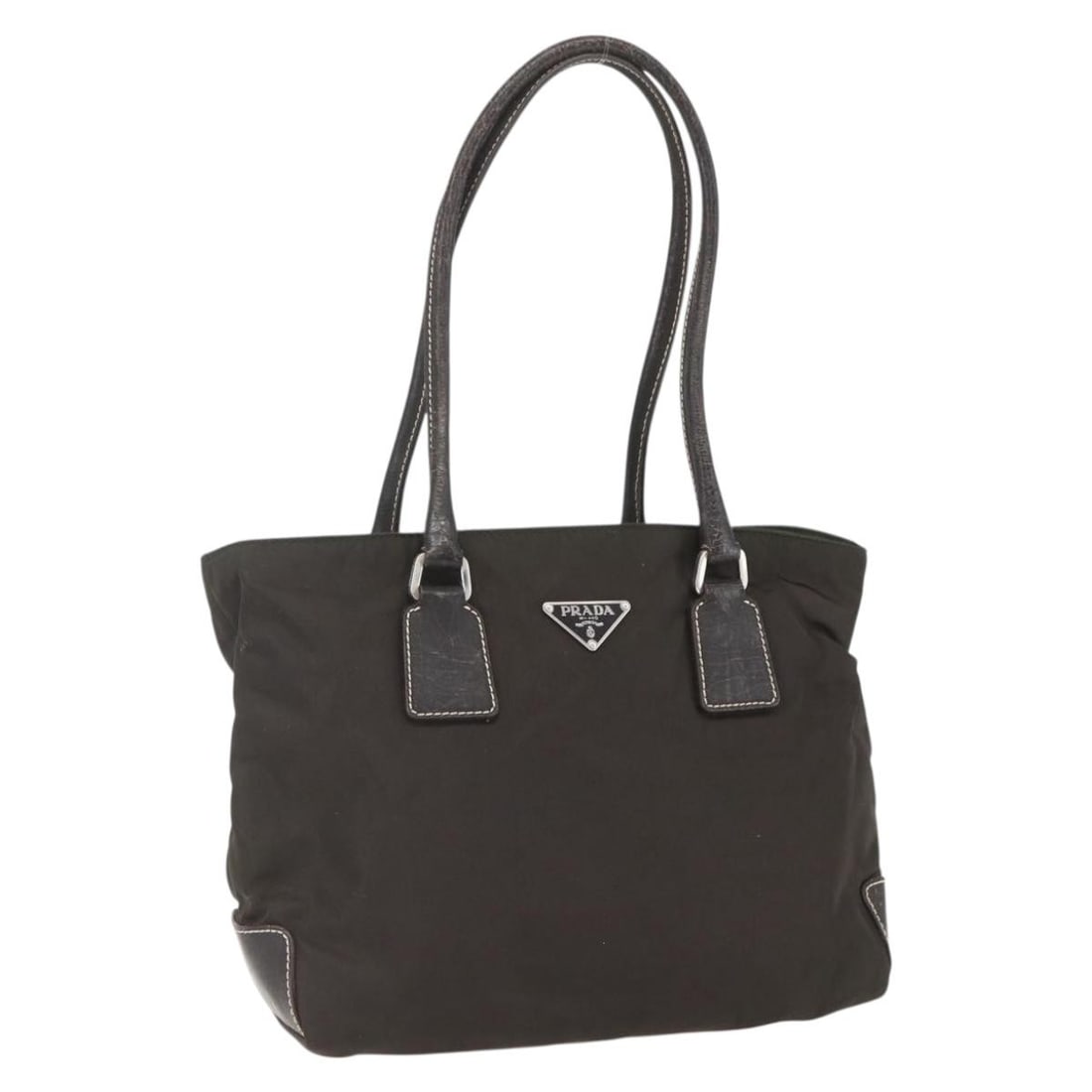 Khaki Silver Nylon Tote by Prada Model BA9383 Italy: Khaki Silver Nylon Tote by Prada Model BA9383 Italy This PRADA tote bag is crafted from khaki nylon with silver-tone accents. It is a heavily used item showing signs of wear, including rubbing, stains