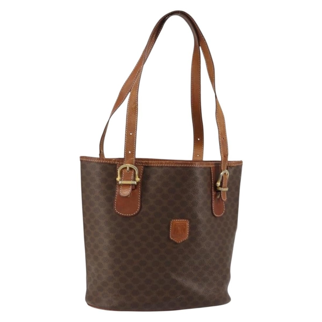 CELINE Macadam Brown Gold PVC Leather Tote Bag Made in Italy: CELINE Macadam Brown Gold PVC Leather Tote Bag Made in Italy This CELINE Macadam Canvas Tote Bag features a stylish blend of brown PVC leather and gold accents, exemplifying sophisticated Italian craf