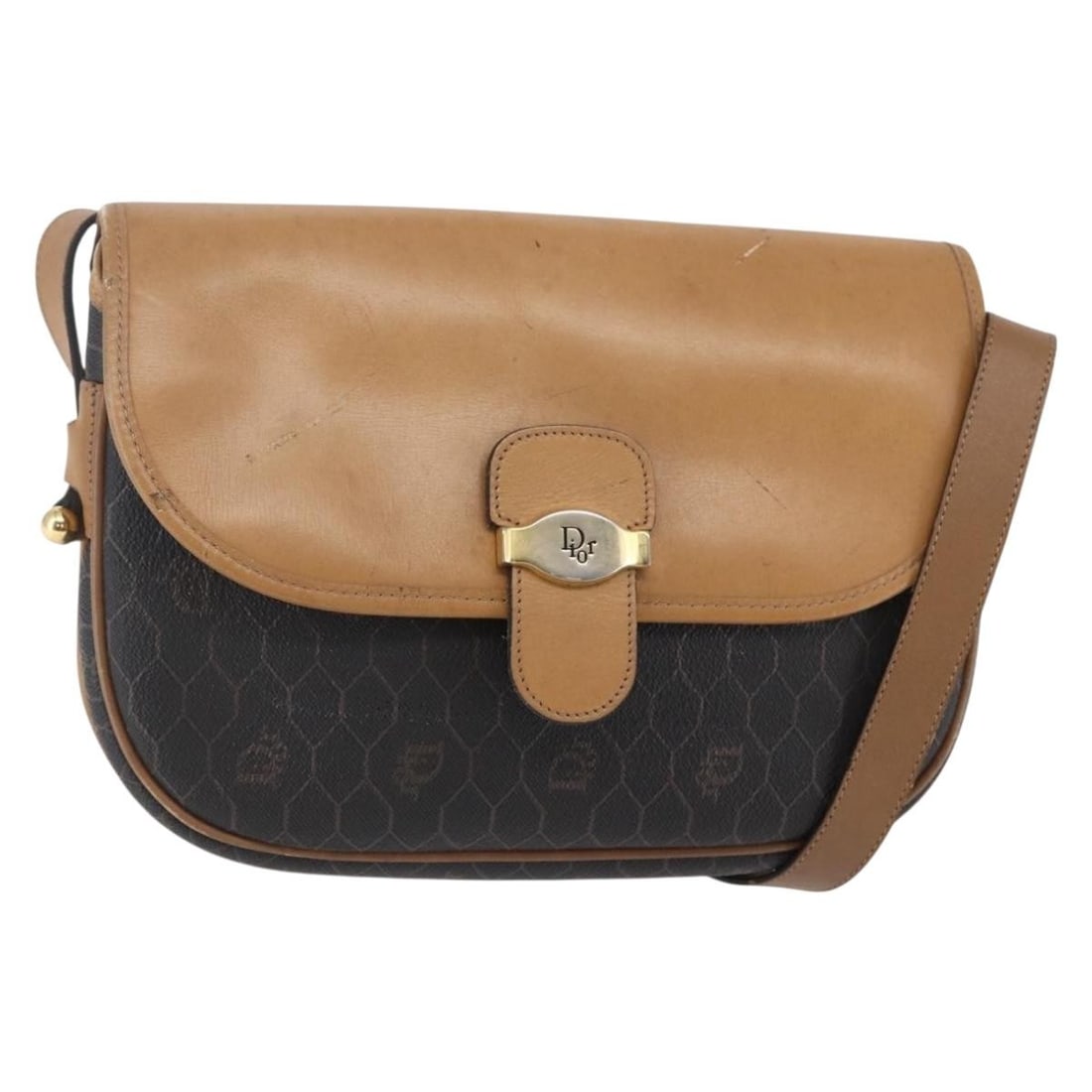 Christian Dior Black PVC Leather Honeycomb Canvas Shoulder Bag: Christian Dior Black PVC Leather Honeycomb Canvas Shoulder Bag This stylish Christian Dior Honeycomb Canvas Shoulder Bag is crafted from durable PVC leather in a classic black color. Designed for prac