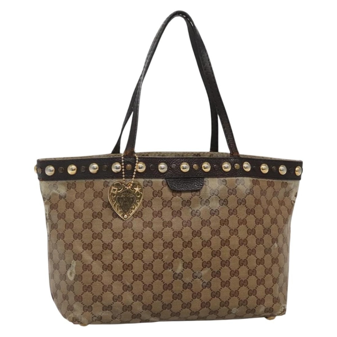 GUCCI GG Crystal Tote Bag Coated Canvas Beige Gold Made in Italy: GUCCI GG Crystal Tote Bag Coated Canvas Beige Gold Made in Italy This authentic GUCCI GG Crystal Tote Bag is crafted from coated canvas in a stylish beige and gold color combination. Measuring approxi