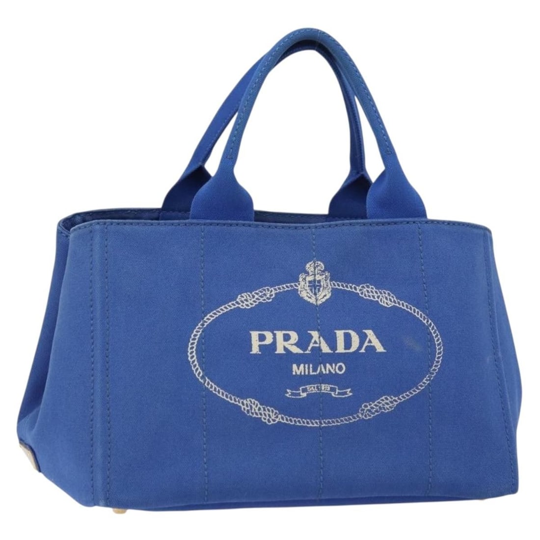 Prada Canapa MM Blue Canvas Handbag with Gold Details and Guarantee Card: Prada Canapa MM Blue Canvas Handbag with Gold Details and Guarantee Card This PRADA Canapa MM handbag features a blue and gold canvas exterior and is crafted in Italy. The bag offers spacious dimensio