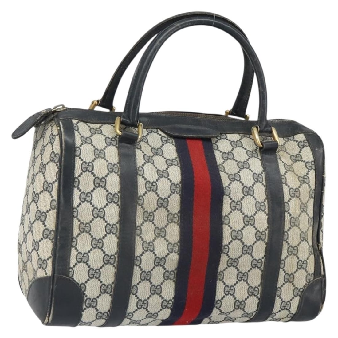 Navy PVC Boston Bag by Gucci GG Supreme Sherry Line Gold Red Accents: Navy PVC Boston Bag by Gucci GG Supreme Sherry Line Gold Red Accents This is a Gucci GG Supreme Sherry Line Boston Bag crafted from PVC leather and GG canvas in navy, gold, and red. Made in Italy, it