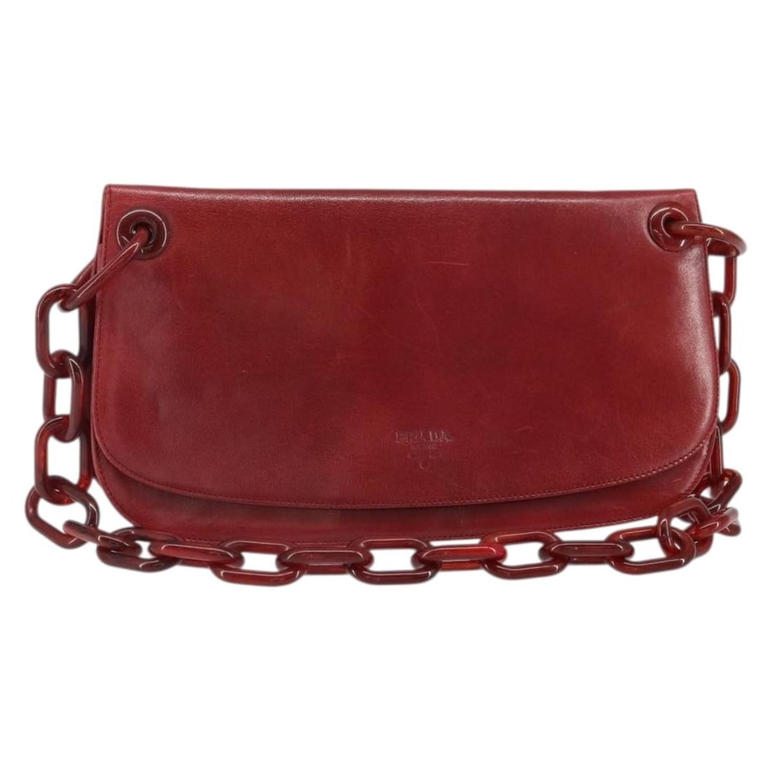 Red Leather PRADA Shoulder Bag with Silver Accents Made in Italy: Red Leather PRADA Shoulder Bag with Silver Accents Made in Italy This PRADA shoulder bag features red and silver leather with a sleek, structured design. Made in Italy, it offers a spacious interior a