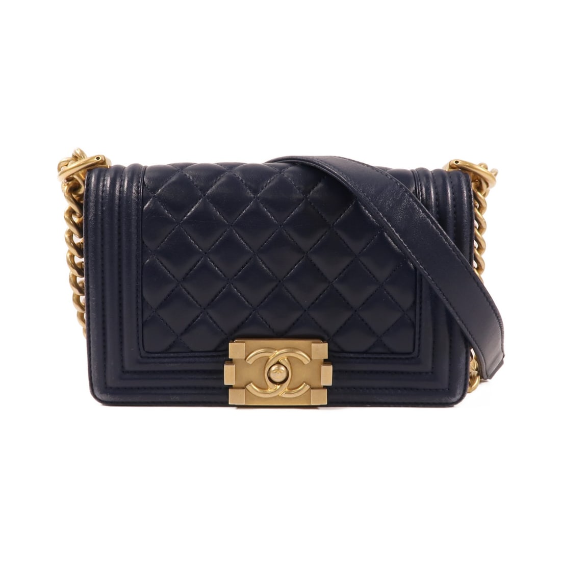 Navy Lambskin Chanel Boy 20cm Shoulder Bag with Gold Hardware: Navy Lambskin Chanel Boy 20cm Shoulder Bag with Gold Hardware This CHANEL Boy shoulder bag features a navy lambskin leather exterior with a classic CC accent. Designed in a compact 20 cm size, it offe