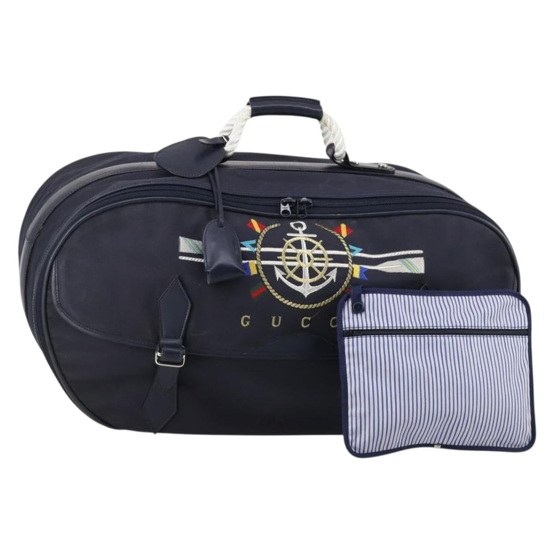 GUCCI Navy Coated Canvas Boston Bag with Accessories: GUCCI Navy Coated Canvas Boston Bag with Accessories This authentic GUCCI travel Boston Bag is crafted from durable coated canvas in a chic navy color. The bag features a spacious design, making it pe