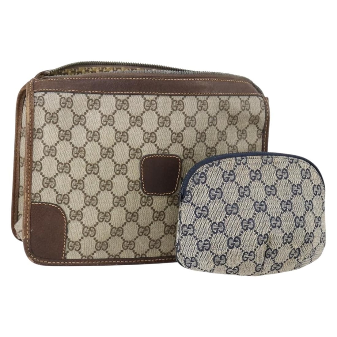 GUCCI GG Supreme Beige Navy Clutch Bag PVC Set of 2 Authentic: GUCCI GG Supreme Beige Navy Clutch Bag PVC Set of 2 Authentic This authentic GUCCI GG Supreme Clutch Bag is a stylish accessory crafted from high-quality GG Canvas, showcasing a chic beige and navy co