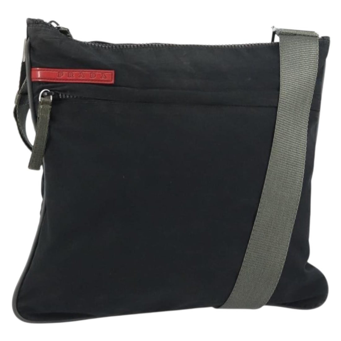 PRADA Nylon Black Silver Shoulder Bag Authentic Italy: PRADA Nylon Black Silver Shoulder Bag Authentic Italy This PRADA Sports Shoulder Bag combines functionality with a sleek design, crafted from durable nylon in a striking black and silver color scheme.