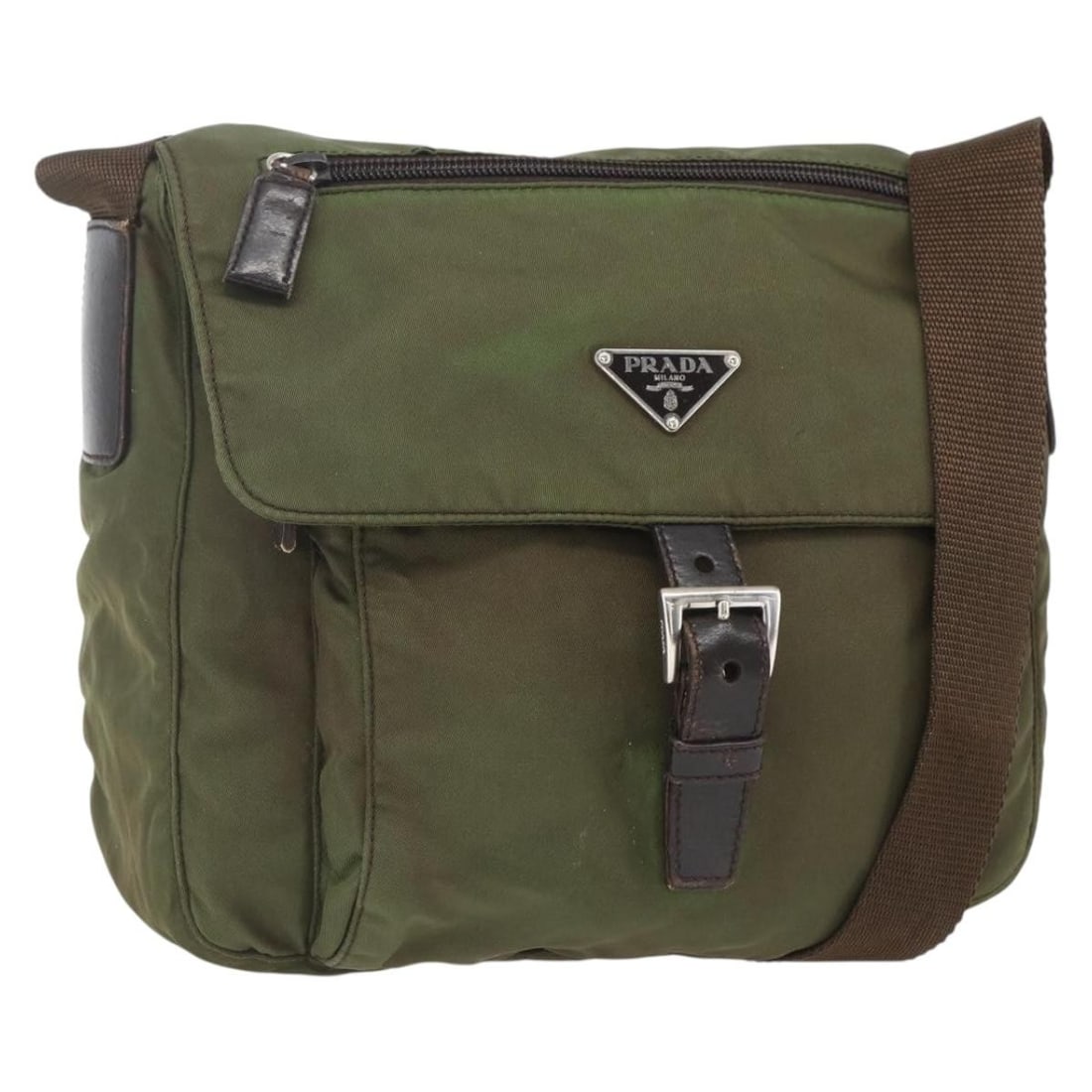 Prada Khaki Nylon Shoulder Bag with Silver Tone Accents Italy: Prada Khaki Nylon Shoulder Bag with Silver Tone Accents Italy This PRADA shoulder bag is crafted from khaki nylon with silver-tone accents. Designed for practical everyday use, it features a top shoul