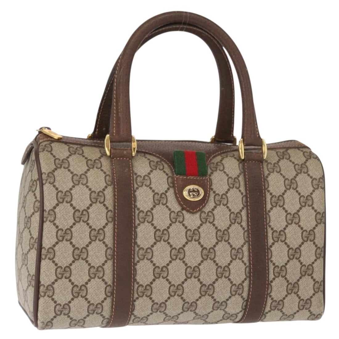 Gucci Beige GG Supreme Web PVC Leather Handbag with 40 02 006 Line: Gucci Beige GG Supreme Web PVC Leather Handbag with 40 02 006 Line This is a Gucci GG Supreme Web Sherry Line handbag crafted from beige and gold PVC leather with GG canvas accents. Designed in Italy,