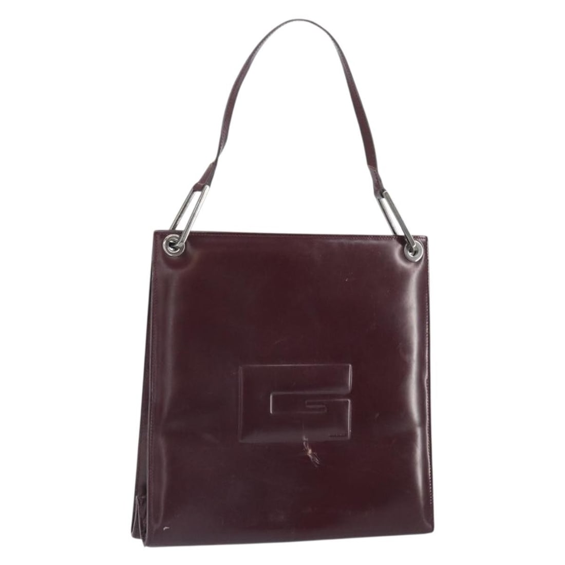 Gucci Bordeaux Patent Leather Shoulder Bag Silver Accents: Gucci Bordeaux Patent Leather Shoulder Bag Silver Accents This GUCCI shoulder bag features a striking Bordeaux patent leather exterior with silver-tone accents. Made in Italy, the bag offers a spaciou