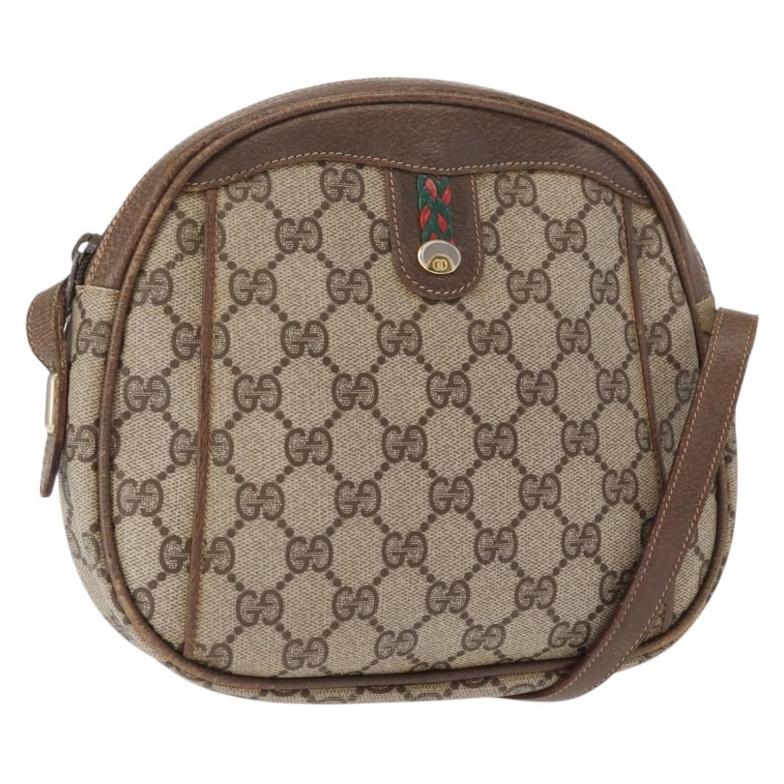 Beige GG Supreme Sherry Web Shoulder Bag by Gucci PVC Leather: Beige GG Supreme Sherry Web Shoulder Bag by Gucci PVC Leather This is a Gucci GG Supreme Web Sherry Line shoulder bag crafted from PVC leather and GG canvas in beige and gold tones. The bag features a