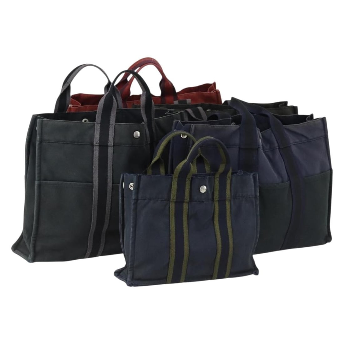 Set of 5 Hermes Fourre Tout Canvas Handbags Black Red Navy: Set of 5 Hermes Fourre Tout Canvas Handbags Black Red Navy This is an un-used Hermes Fourre Tout hand bag set featuring five pieces crafted from cotton in black, red, and navy. Made in France, this se