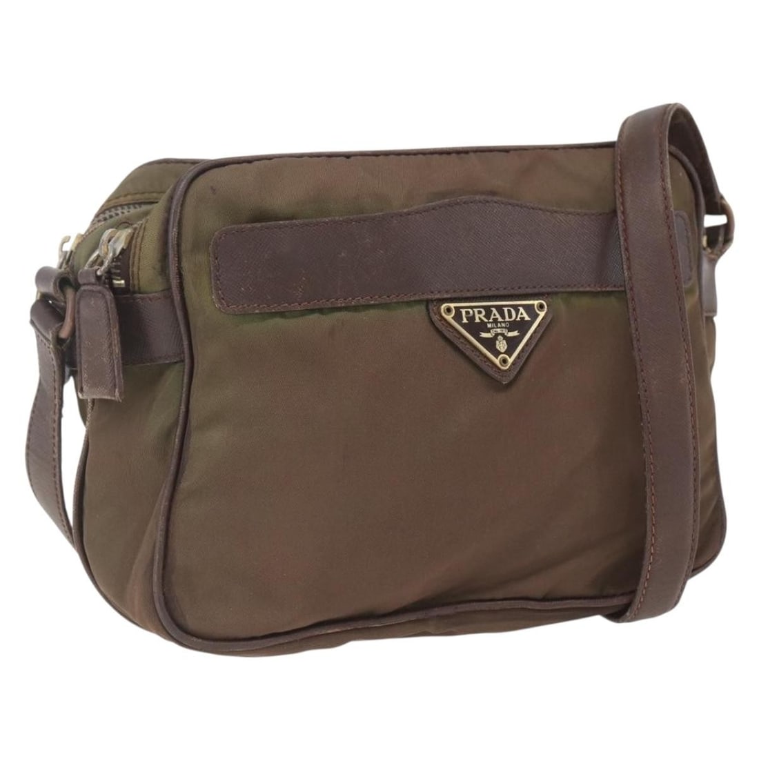 Brown Nylon Shoulder Purse by PRADA Italy: Brown Nylon Shoulder Purse by PRADA Italy This PRADA shoulder bag is crafted from brown nylon and features a classic silhouette. Made in Italy, it offers a practical design with an adjustable shoulder