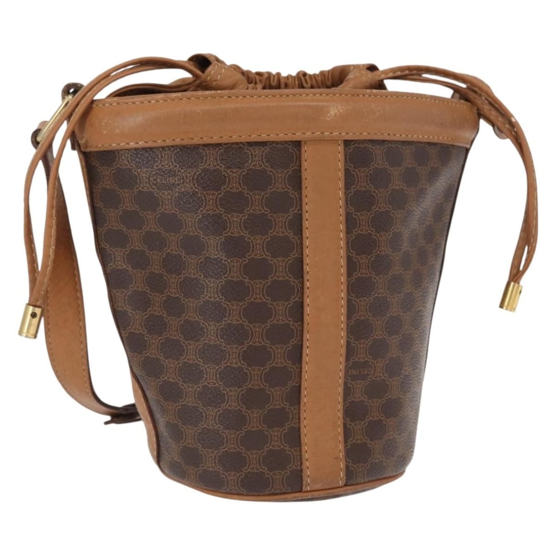 Brown Macadam Canvas Shoulder Bag by CELINE with PVC Leather Trim: Brown Macadam Canvas Shoulder Bag by CELINE with PVC Leather Trim This CELINE Macadam shoulder bag features a combination of PVC leather and signature Macadam canvas in brown and gold tones. Made in