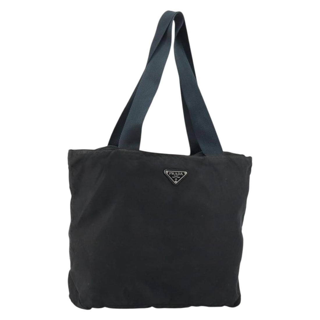 Prada Black Nylon Tote with Silver Accents and Guarantee Card: Prada Black Nylon Tote with Silver Accents and Guarantee Card This PRADA tote bag is crafted from black nylon with silver-tone accents. It features dual top handles, a spacious interior, and comes wit