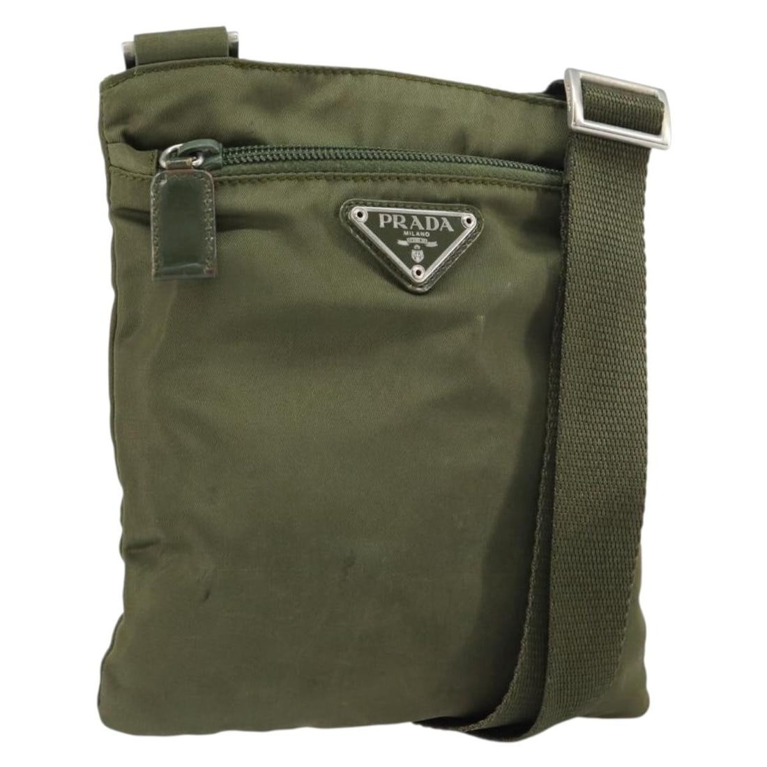 Prada Khaki Nylon Shoulder Bag Silver Tone Made in Italy BA9173: Prada Khaki Nylon Shoulder Bag Silver Tone Made in Italy BA9173 This is a PRADA shoulder bag crafted from khaki nylon with silver-tone accents. Made in Italy, the bag features a compact design with an