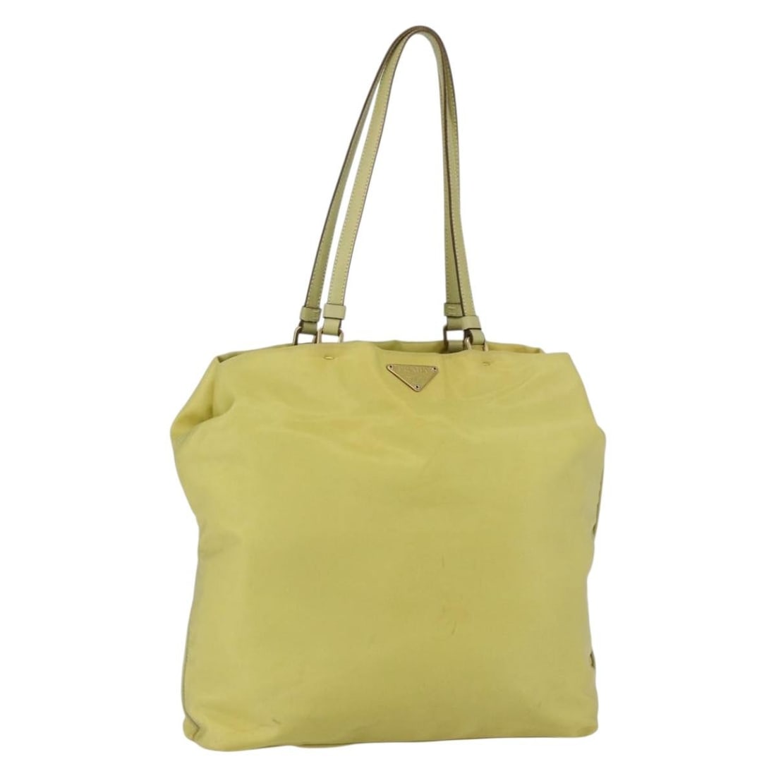 Prada Yellow Nylon Tote Bag with Gold Tone Accents Made in Italy: Prada Yellow Nylon Tote Bag with Gold Tone Accents Made in Italy This PRADA tote bag is crafted from durable nylon in a vibrant yellow and gold color combination. Designed as a spacious tote, it featu