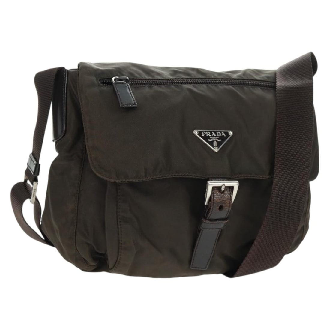 Prada Khaki Nylon Shoulder Bag with Silver Tone Hardware and Guarantee Card: Prada Khaki Nylon Shoulder Bag with Silver Tone Hardware and Guarantee Card This is a PRADA shoulder bag crafted from khaki nylon with silver-tone accents. The bag is designed with an adjustable shoul