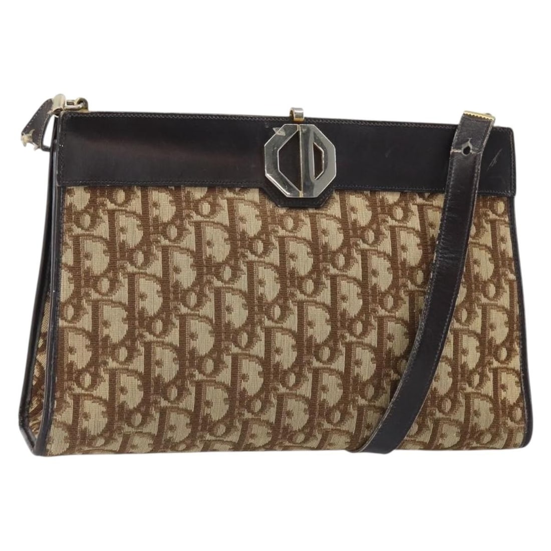 Beige Gold Trotter Canvas Shoulder Bag by Christian Dior: Beige Gold Trotter Canvas Shoulder Bag by Christian Dior This Christian Dior Trotter Canvas Shoulder Bag features the iconic beige and gold Trotter canvas exterior. The bag is designed with a comforta