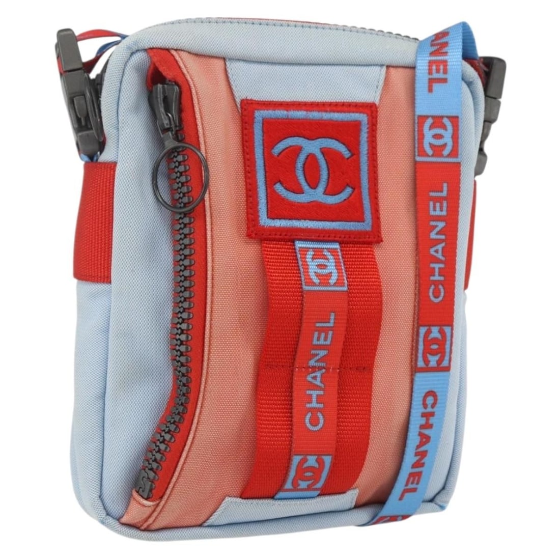 Chanel Sports Line Canvas Shoulder Bag Light Blue Silver Italy: Chanel Sports Line Canvas Shoulder Bag Light Blue Silver Italy This CHANEL Sports Line shoulder bag features a light blue and silver canvas exterior, designed for a sporty yet elegant look. Made in It