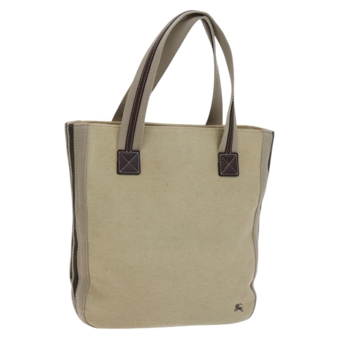 Burberry Blue Label Beige Canvas Tote Bag Made in Japan: Burberry Blue Label Beige Canvas Tote Bag Made in Japan This Burberry Blue Label Tote Bag is a stylish and practical accessory crafted from durable canvas in a classic beige hue. It features a spaciou