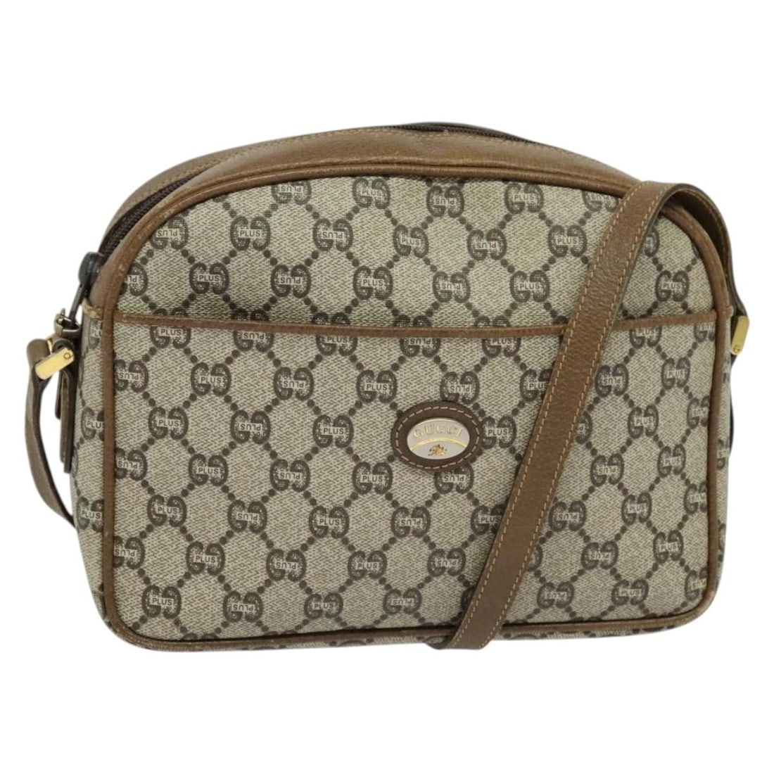 GUCCI GG Plus Supreme Beige Gold PVC Shoulder Bag Italy: GUCCI GG Plus Supreme Beige Gold PVC Shoulder Bag Italy This GUCCI GG Plus Supreme Shoulder Bag is a stylish accessory, expertly crafted from durable PVC leather in a sophisticated beige and gold colo