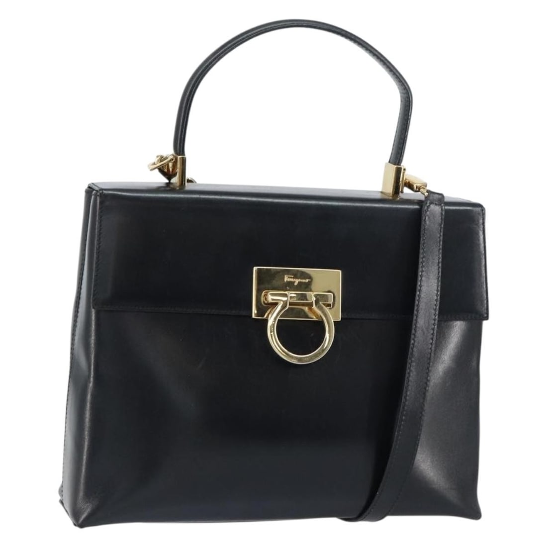 Salvatore Ferragamo Gancini Leather Hand Bag Black Gold Made in Italy: Salvatore Ferragamo Gancini Leather Hand Bag Black Gold Made in Italy This Salvatore Ferragamo Gancini Hand Bag combines luxury and practicality, crafted from high-quality leather in a sophisticated b