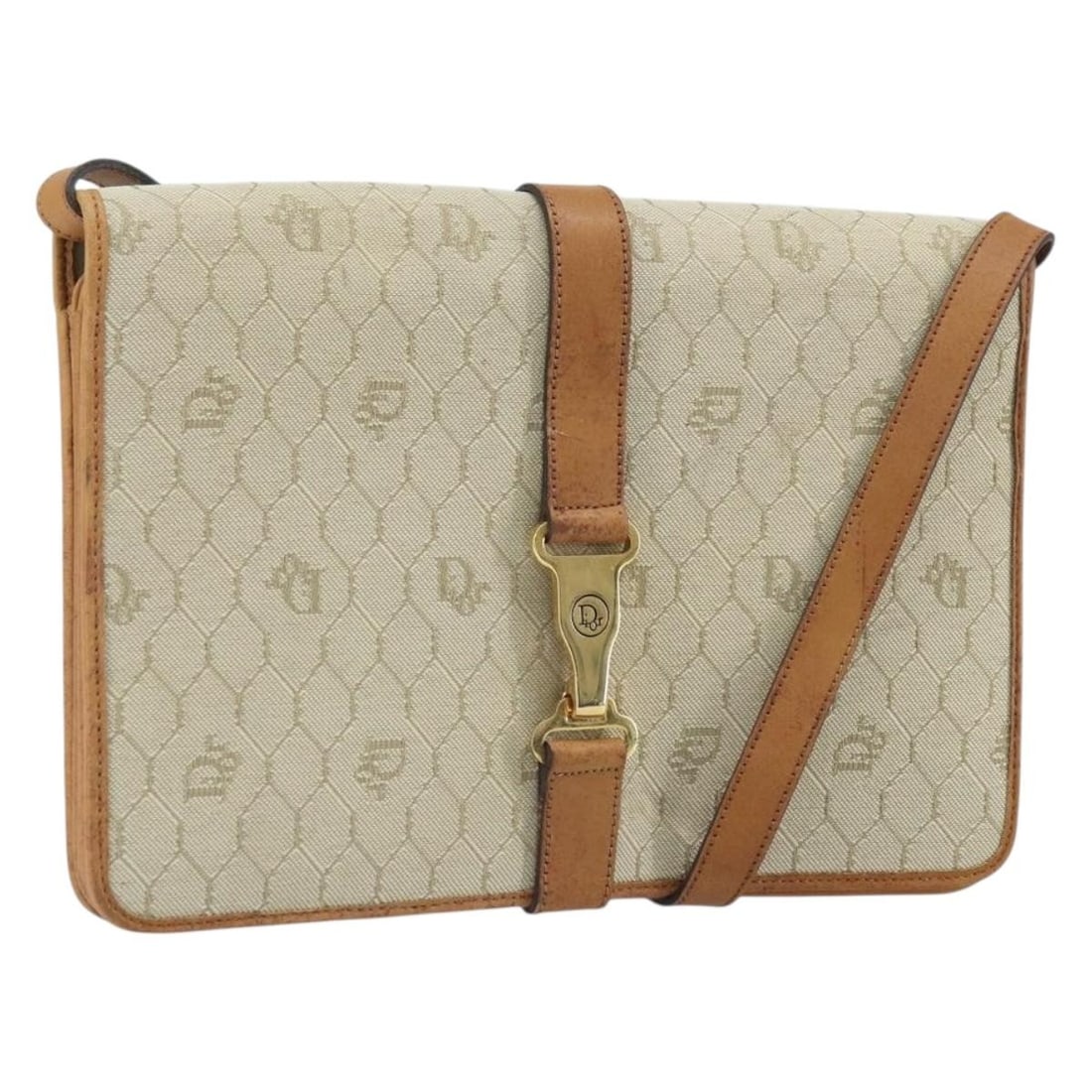 Beige Honeycomb Canvas PVC Shoulder Bag by Christian Dior: Beige Honeycomb Canvas PVC Shoulder Bag by Christian Dior This Christian Dior shoulder bag features a distinctive honeycomb canvas design with PVC leather accents in beige and gold tones. Made in