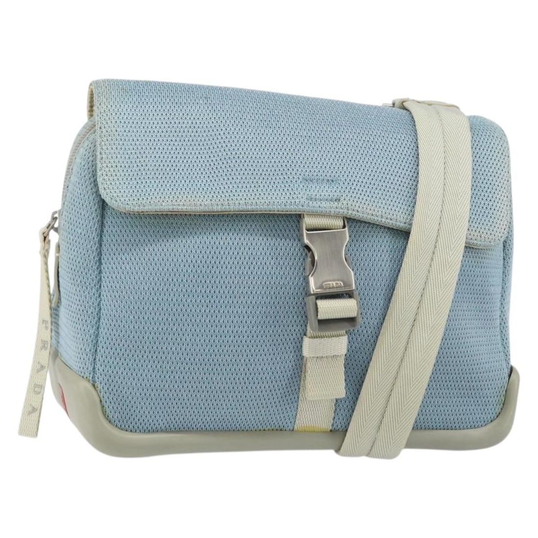 Light Blue Nylon PRADA Shoulder Bag with Silver Accents: Light Blue Nylon PRADA Shoulder Bag with Silver Accents This PRADA shoulder bag is crafted from light blue nylon with silver-tone accents. Made in Italy, it features a classic shoulder bag design with
