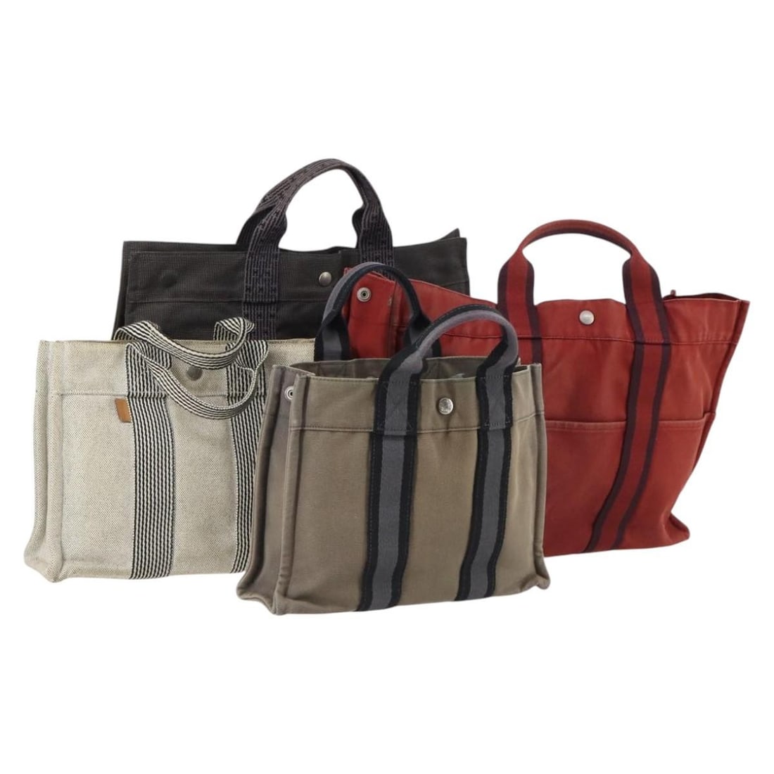 HERMES Her Line Fourre Tout Bag Canvas 4Set Red Brown Gray Auth: HERMES Her Line Fourre Tout Bag Canvas 4Set Red Brown Gray Auth Introducing the HERMES Her Line Fourre Tout Bag, a stylish and versatile hand bag crafted from durable canvas. This bag features a capti