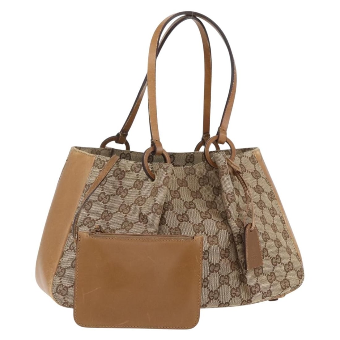 GUCCI Beige GG Canvas Tote Bag 94898 Authentic Italy: GUCCI Beige GG Canvas Tote Bag 94898 Authentic Italy This authentic GUCCI GG Canvas Tote Bag in a sophisticated beige color is a testament to Italian craftsmanship. The stylish tote features a durable